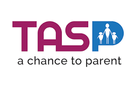 The letters TASP in purple.  Inside the blue "P" is a silhouette image of a parent holding the hands of two young children.  Underneath the letters it says "A Chance to Parent."