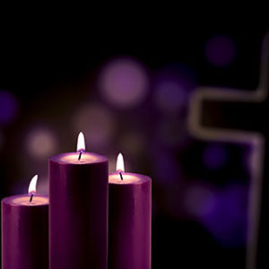 Purple candles with cross